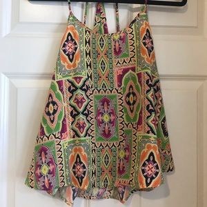 Multicolored top with strappy detail in the back.